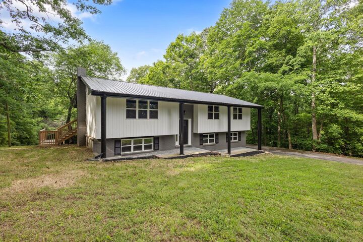 Property Photo:  711 Omega Drive  TN 37397 