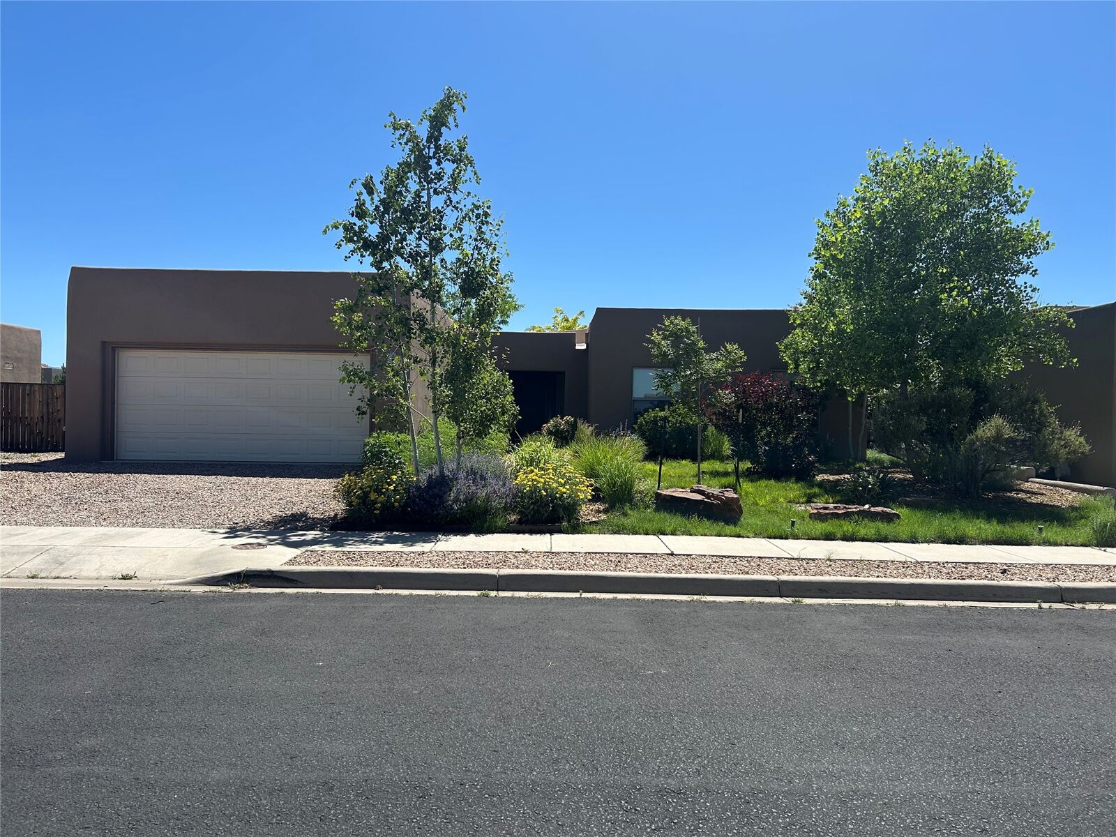 Property Photo: 28 Canto Del Pajaro NM 87508