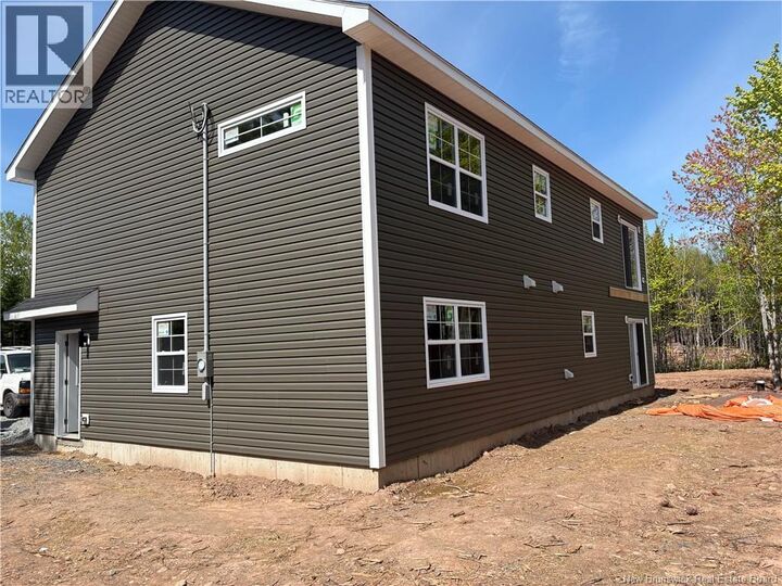 Property Photo:  50 Berry Drive  NB E3B 0V9 