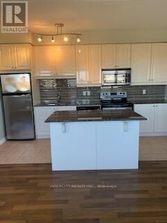 Property Photo:  9225 Jane Street 404  ON L6A 0J7 
