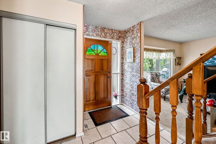 Property Photo:  4 Windermere Crescent  AB T8N 3S5 