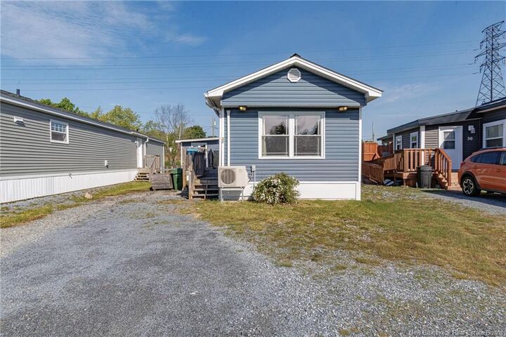 Property Photo:  32 Violet Street  NB E2M 5M3 