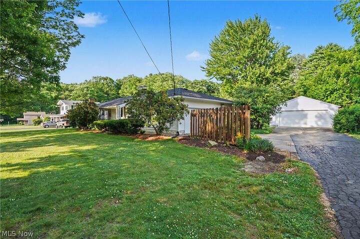 Property Photo:  1974 Silver Fox Lane NE  OH 44484 