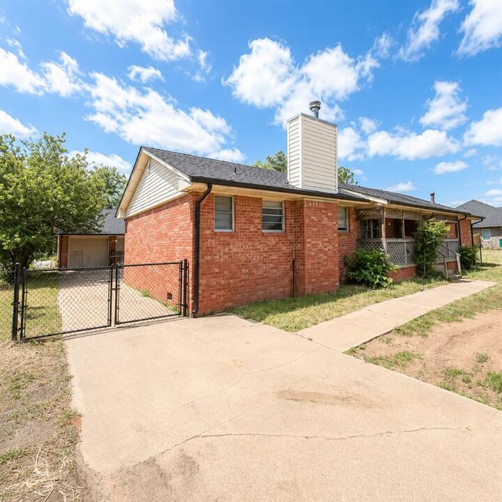 Property Photo:  404 NW 122nd Street  OK 73114 
