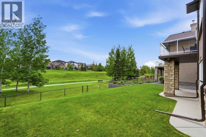 Property Photo: 106 Panatella Crescent Northwest AB T3K 0H4