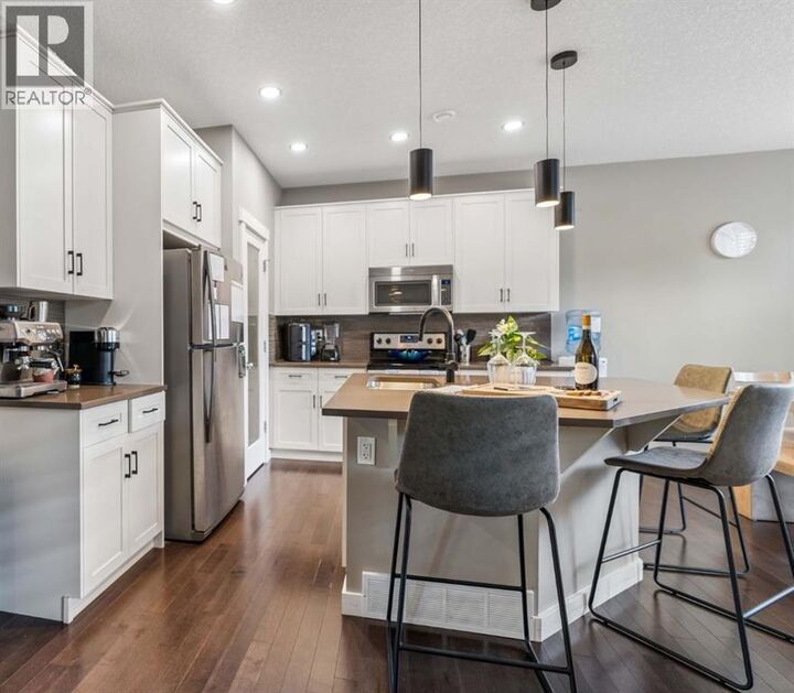 Property Photo: 144 Sunrise View AB T4C 0T7