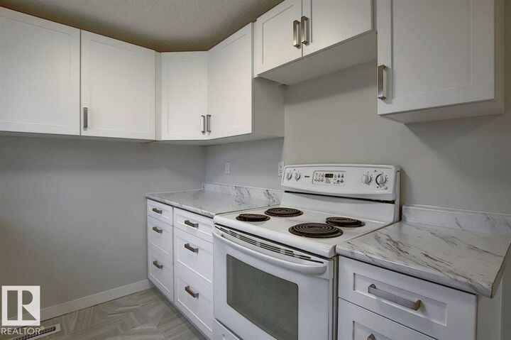 Property Photo: 11F Clareview Village NW AB T5A 3P2