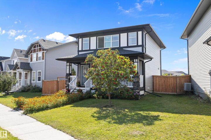 Property Photo:  9852 217 Street NW  AB T5T 4T7 
