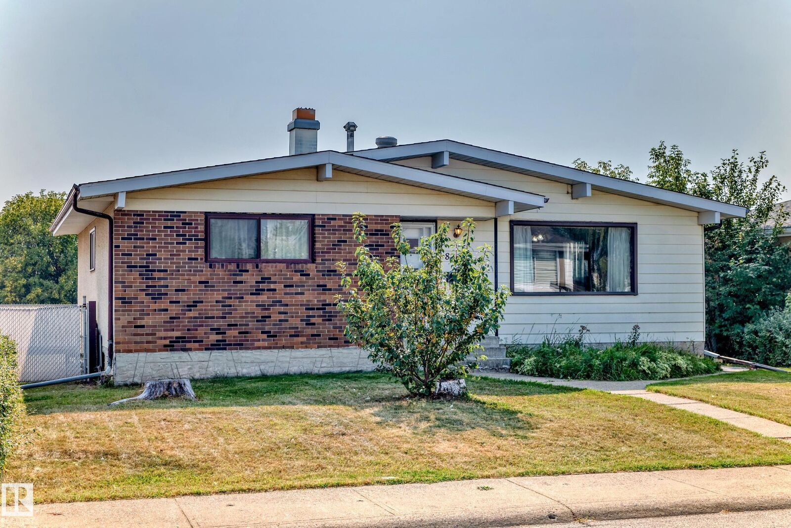 Property Photo: 8311 150 Avenue NW AB T5E 1B9