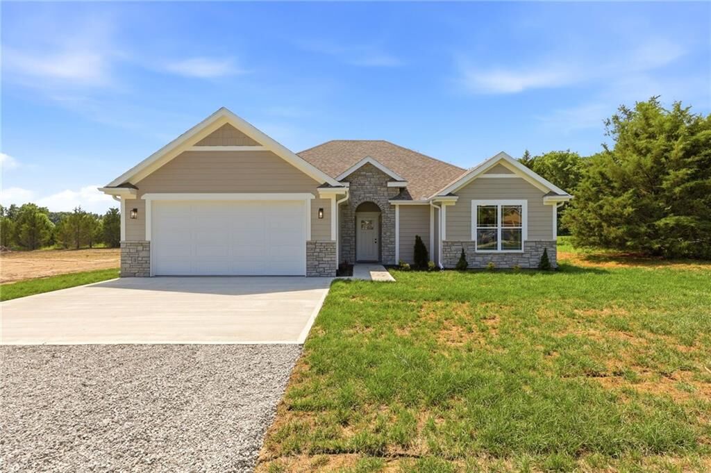 Property Photo:  328 NE 51st Road  MO 64093 