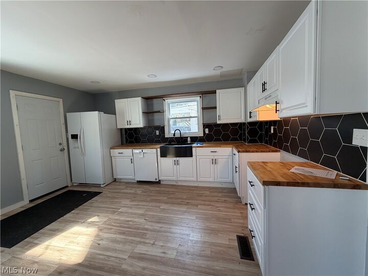 Property Photo:  951 Roanoke Road  OH 44121 