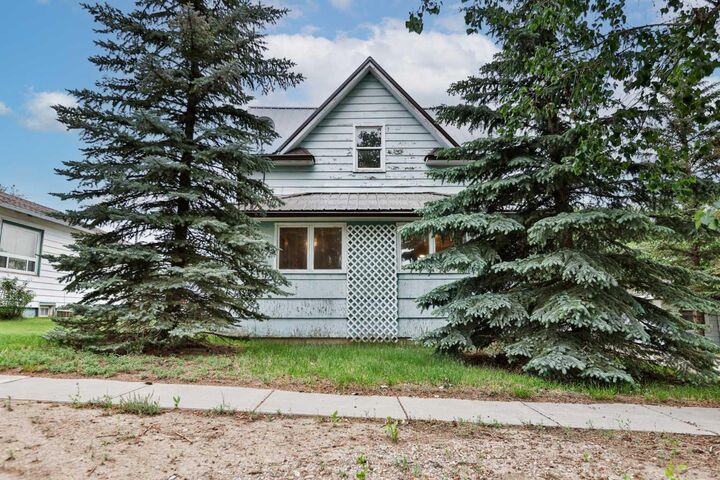 Property Photo:  221 1 Street S  AB T0L 1G0 
