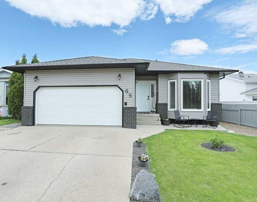 Property Photo: 65 Parkland Way E AB T1R 0M6