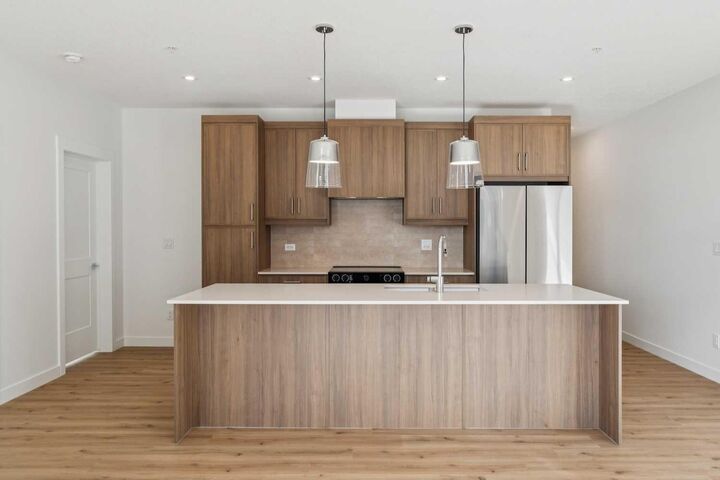 Property Photo: 3700 Seton Avenue SE 3107 AB T3M 4K4