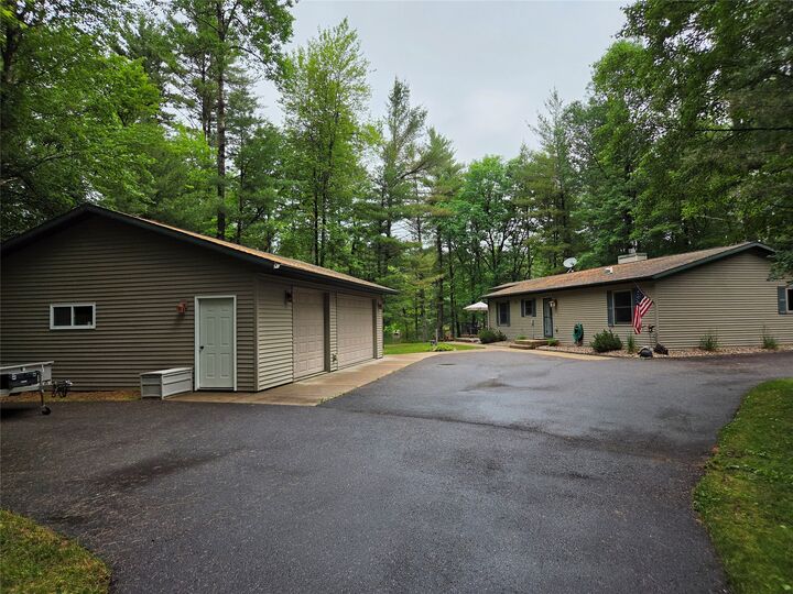 Property Photo:  W8842 Emerald Lake Road  WI 54615 