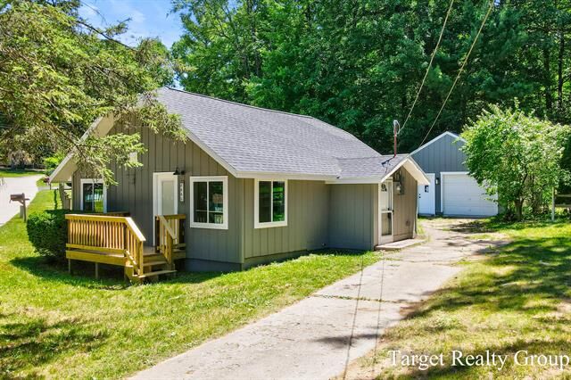 Property Photo:  8660 Merry Drive NE  MI 49341 
