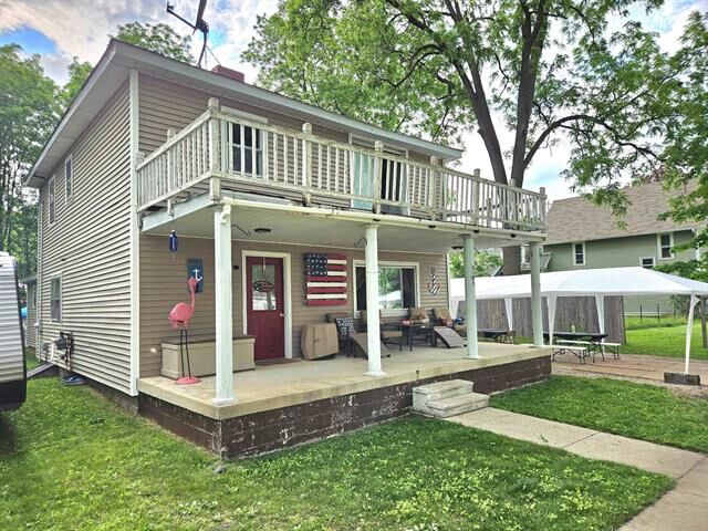 Property Photo:  108 S Huron  MI 49651 
