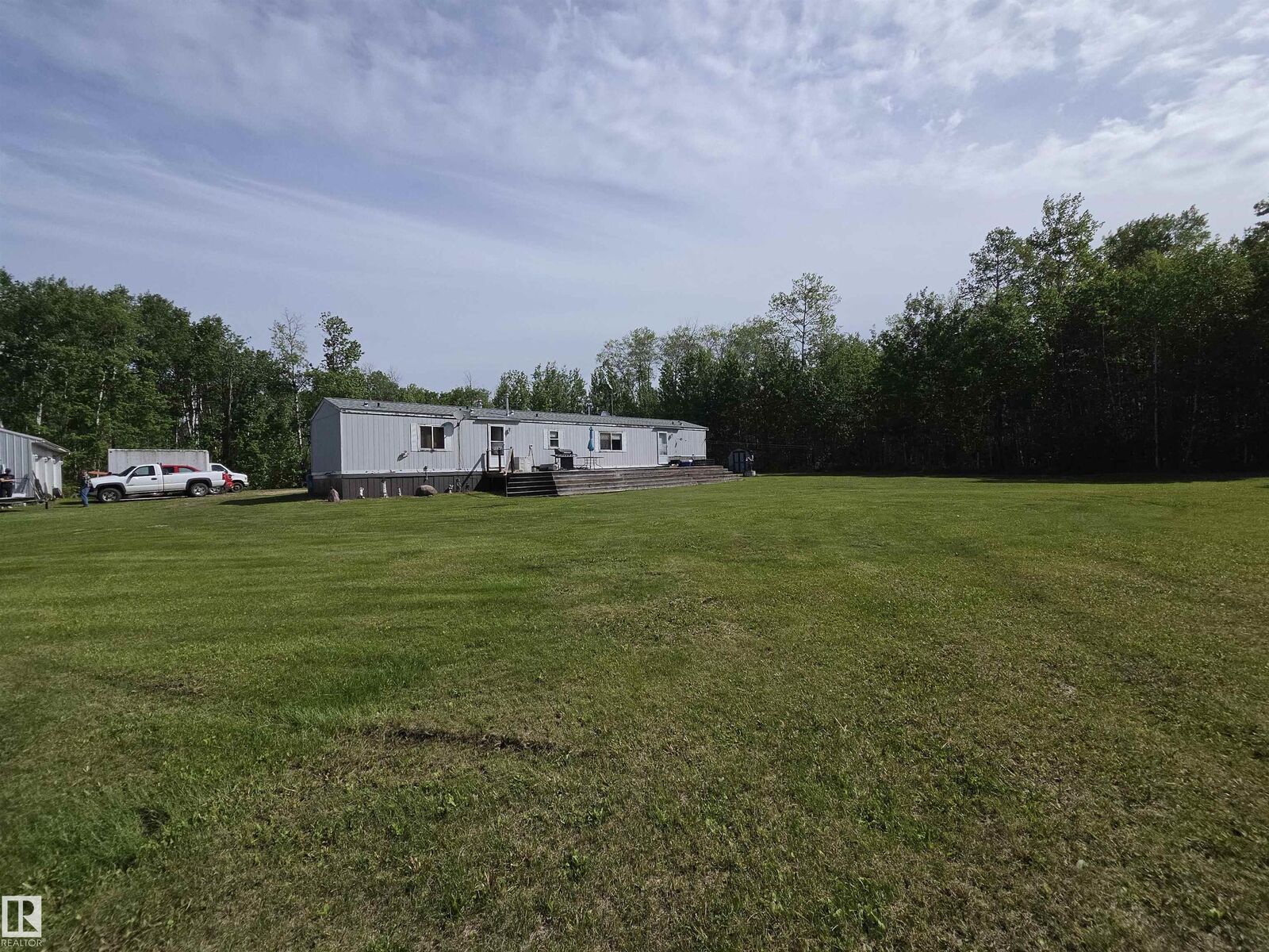 Property Photo: 64126 Hwy 897 AB T9M 1P4