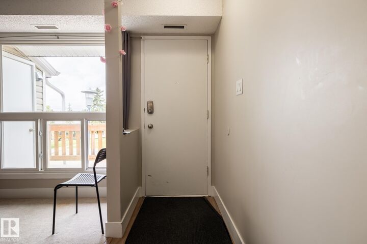 Property Photo:  2703 79 Street NW 8  AB T6K 3Z6 