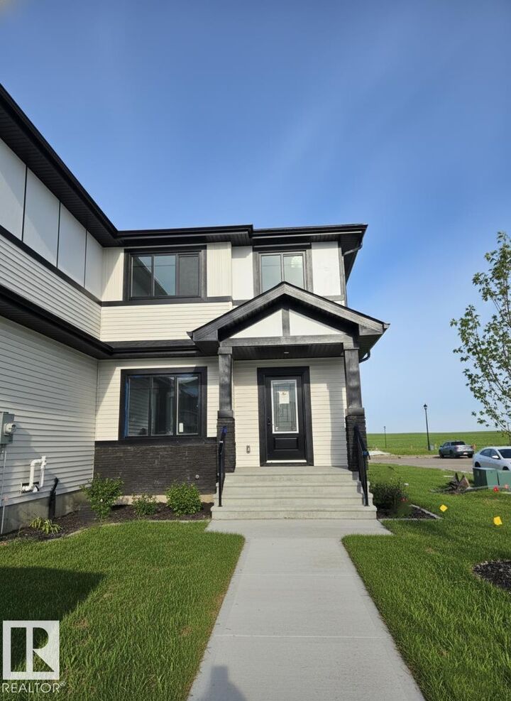 9802 107 Morinville Avenue Mainfloor — photo 1