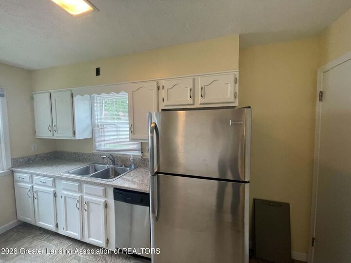 Property Photo:  1217 N Hayford Avenue  MI 48912 