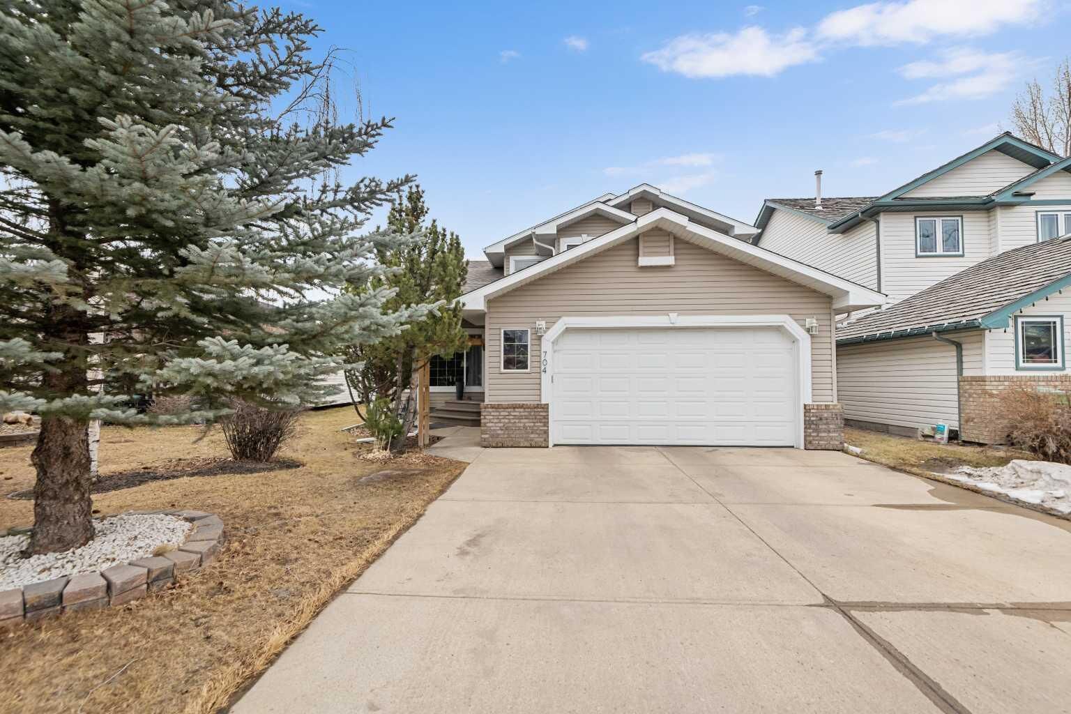 Property Photo: 704 Woodside Drive NW AB T4B 2G9