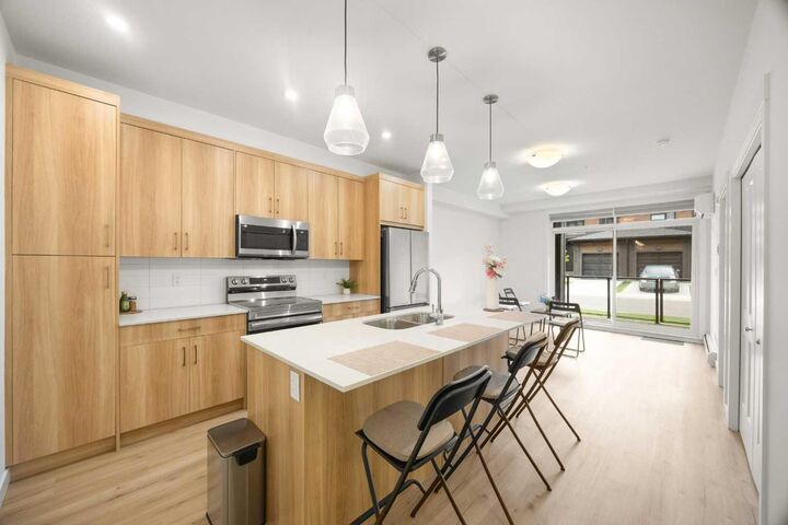 Property Photo:  55 Lucas Way NW 2104  AB T3P 2C7 
