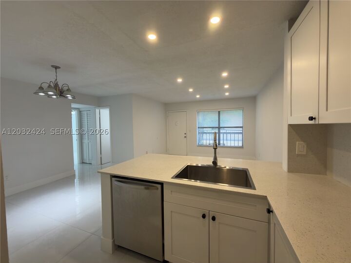 Property Photo:  2500 W 67th Pl 21-26  FL 33016 