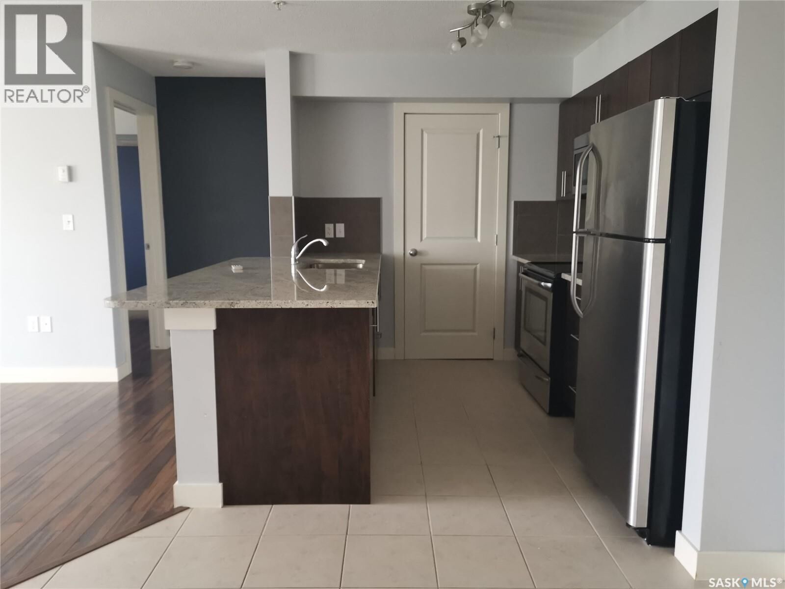 Property Photo: 104 306 Petterson Drive SK S4A 2A8