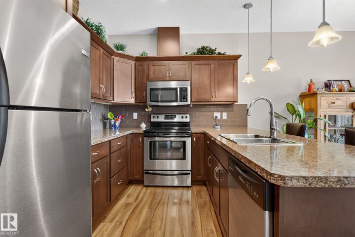 Property Photo: 7293 South Terwillegar Drive NW 91 AB T6R 0N5
