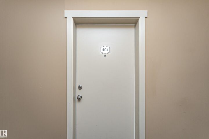 Property Photo:  12045 22 Avenue SW 404  AB T6W 2Y2 