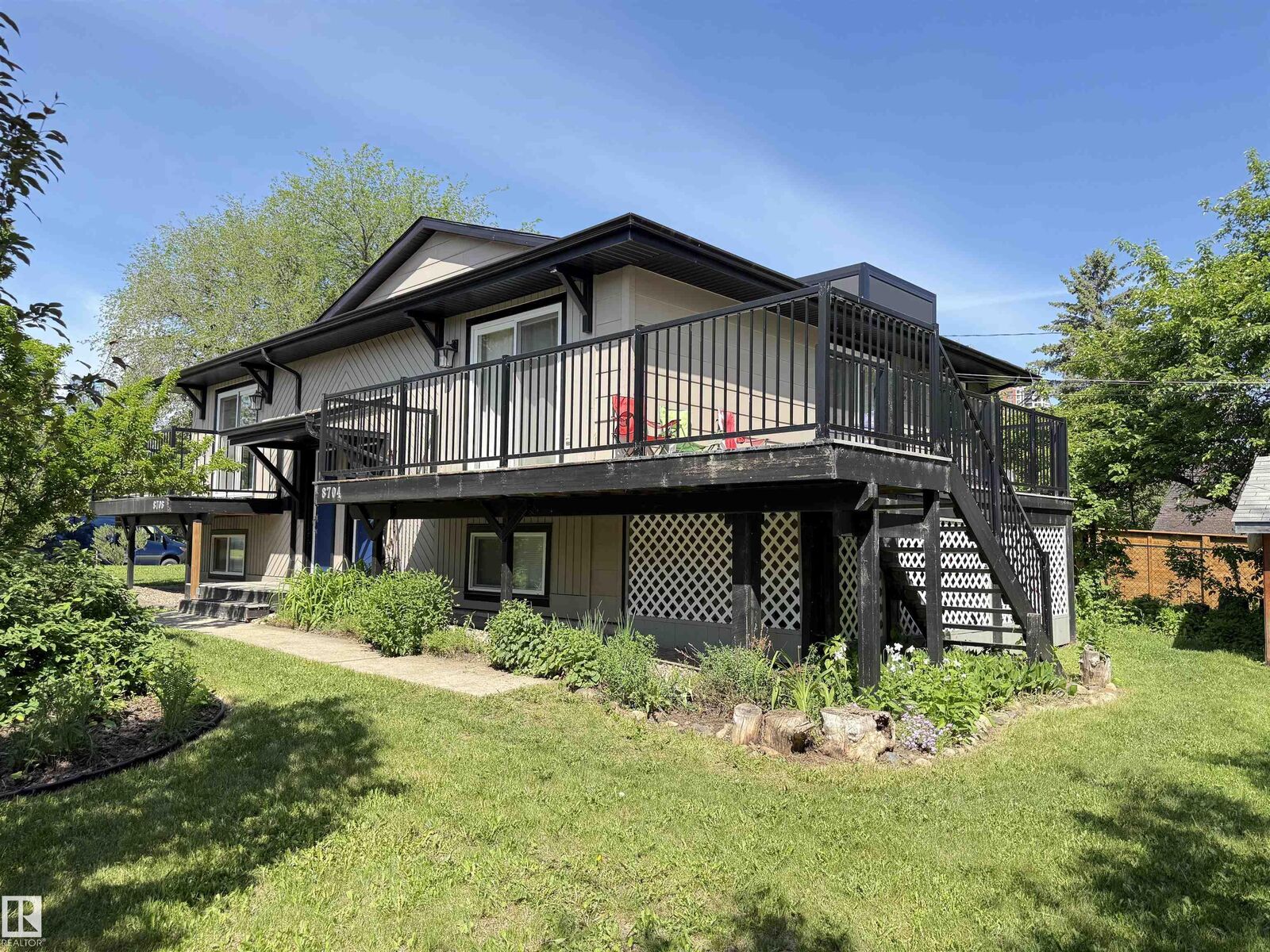 Property Photo:  8704 102 Avenue NW  AB T5H 4B7 