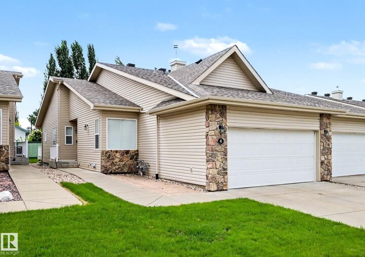 Property Photo: 2031 Brennan Crescent NW 6 AB T5T 0W3