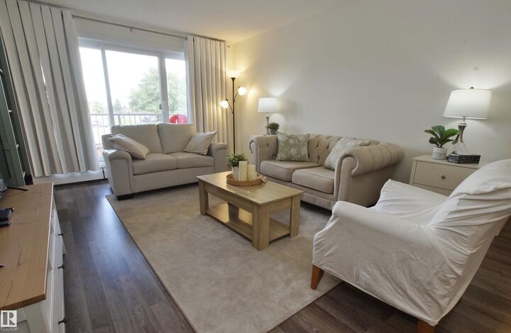 Property Photo:  4404 122 Street NW 235  AB T6H 4E2 