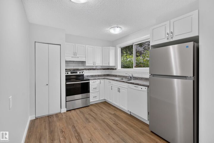 Property Photo:  117 Habitat Crescent NW  AB T5A 3K8 