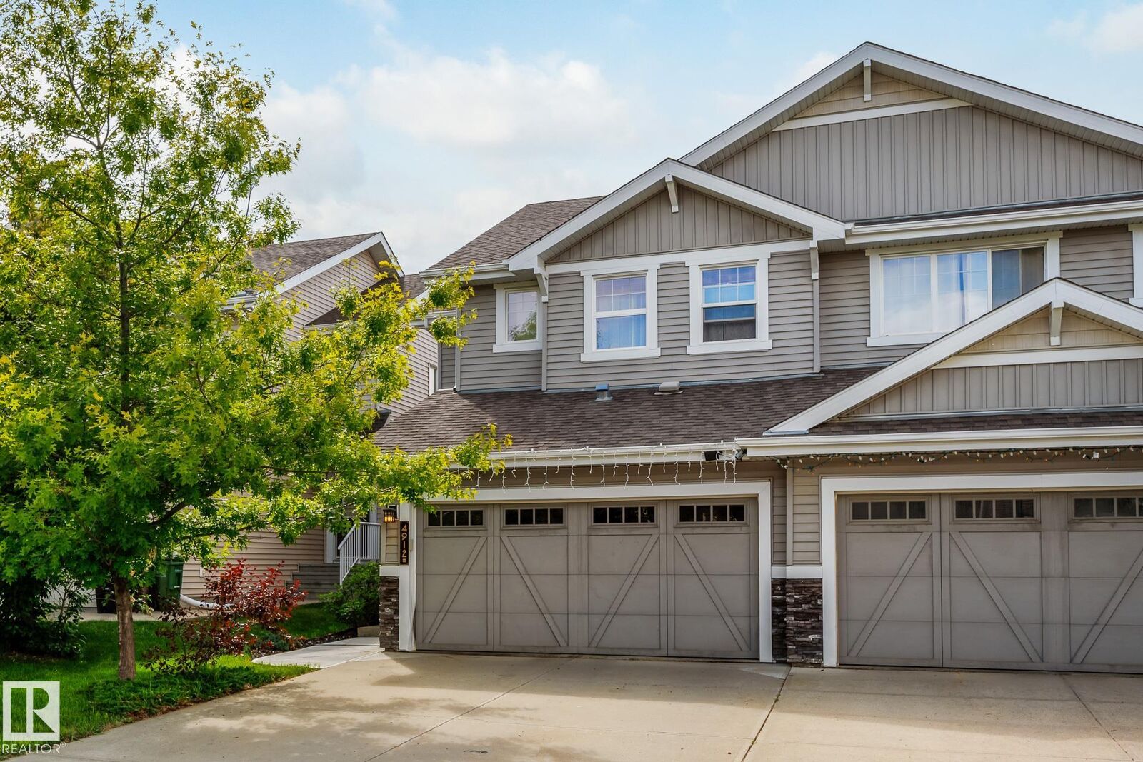 Property Photo:  4912 213 Street NW  AB T6M 0G6 