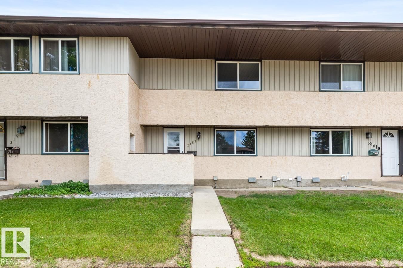 Property Photo: 3159 138 Avenue NW AB T5Y 1R1