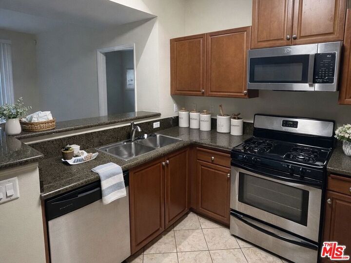Property Photo:  13941 Sherman Way 204  CA 91405 