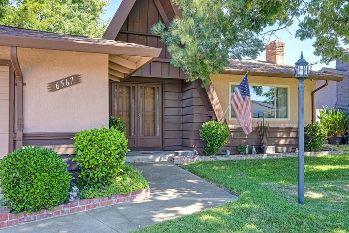 Property Photo:  6567 Woodpark Way  CA 95621 