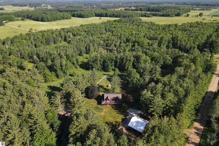 Property Photo:  8100 Hodge Road  MI 49649 
