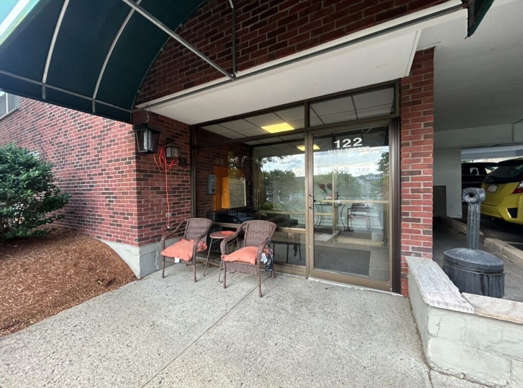Property Photo:  122 Main Street 402  MA 02180 