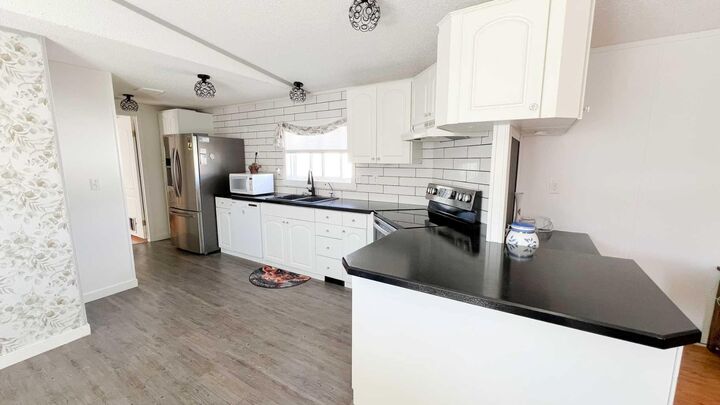 Property Photo: 119 Clark Crescent AB T8W 5K5
