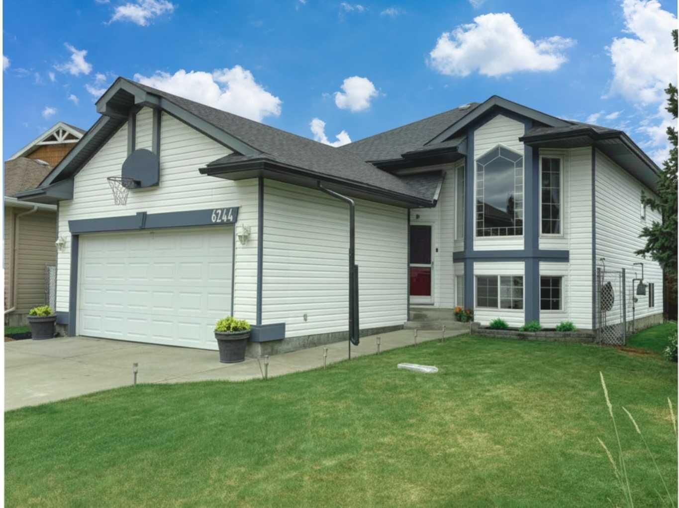 Property Photo: 6244 Cypress Close AB T4H 1M7