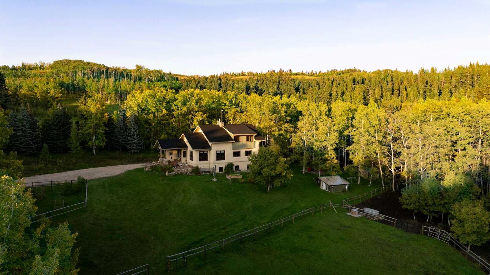 Property Photo:  290108 Parkins Road W 200  AB T0L 1K0 