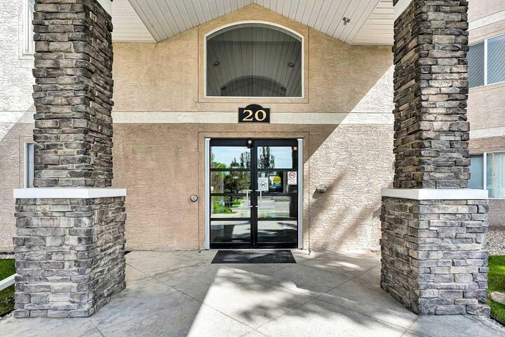 Property Photo: 20 Country Hills View NW 106 AB T3K 5A3