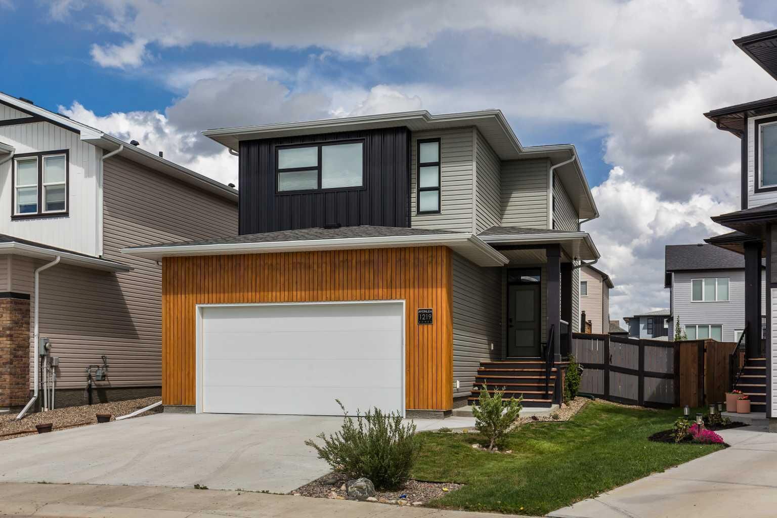 Property Photo: 1219 Pacific Circle W AB T1J 5V4