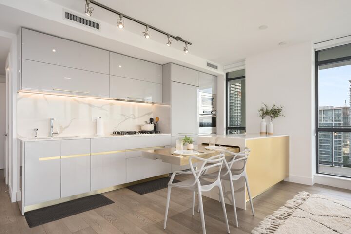 Property Photo:  4488 Juneau Street 1903  BC V5C 0M4 