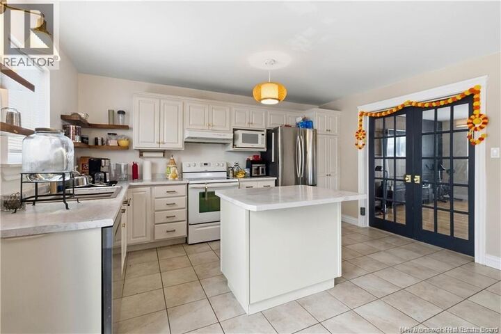 Property Photo: 109 Stillwater Drive NB E1E 0E3
