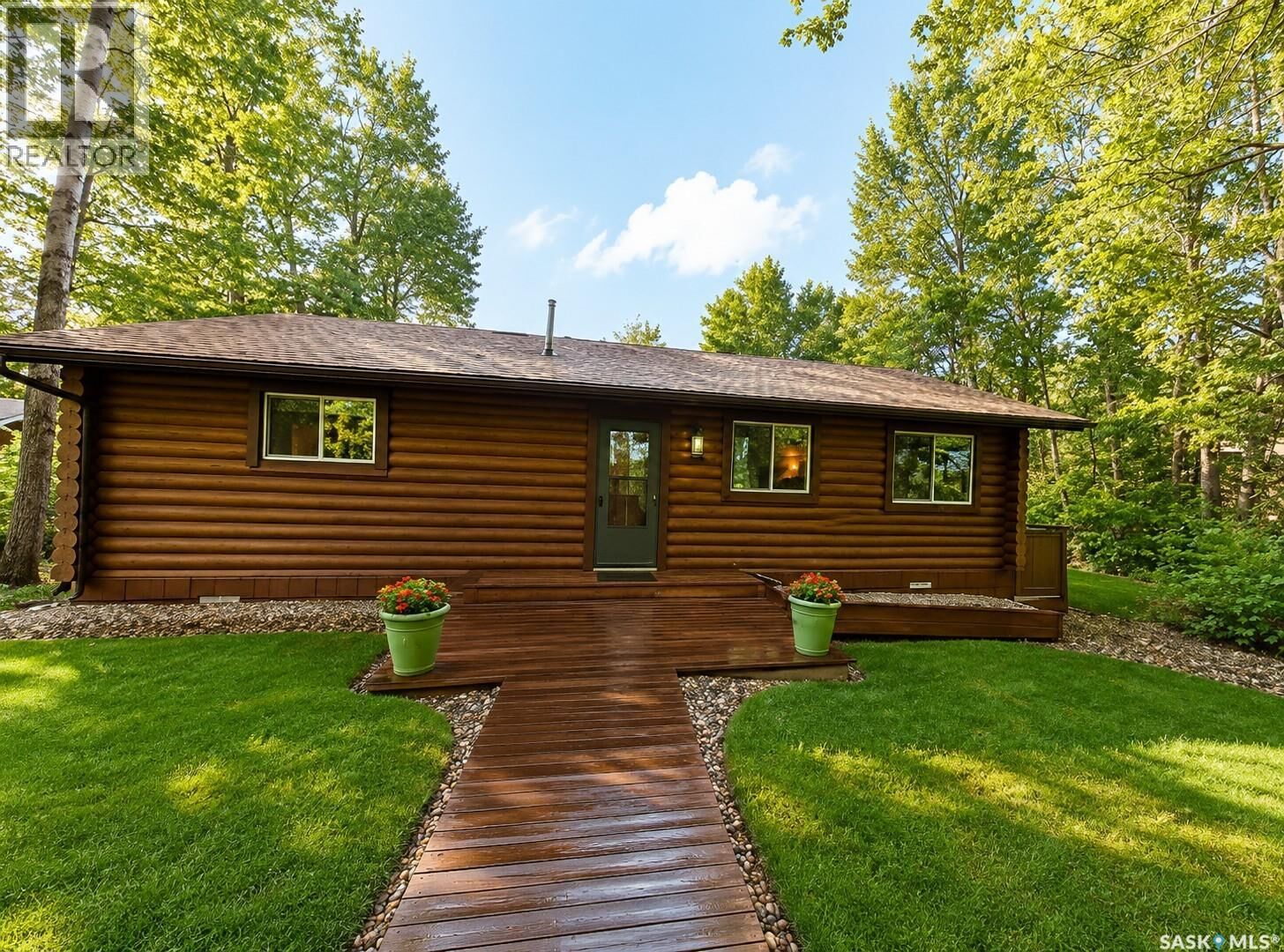 Property Photo: 102 Oskunamoo Drive SK S0E 1H0