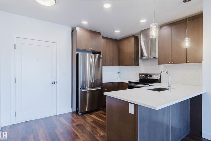 Property Photo: 1316 Windermere Way SW 205 AB T6W 2J3